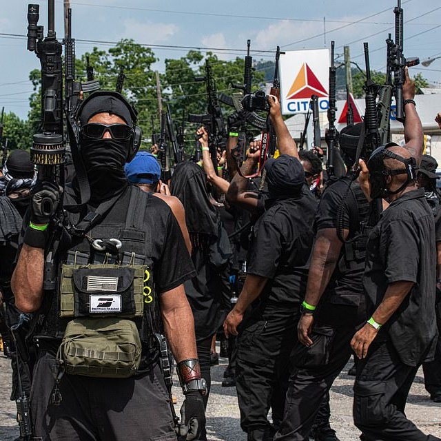 Armed Black protesters march through Confederate memorial park